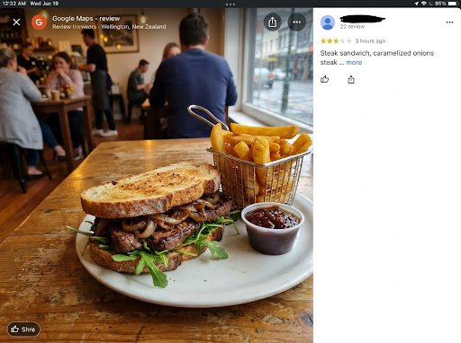 Prime steak sandwich with shoestring fries and tomato relish
